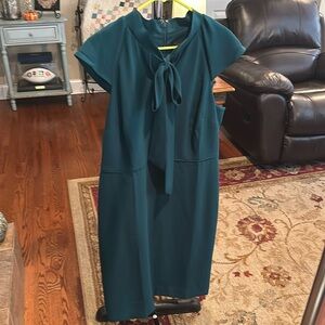 J Crew. Perfect for the holidays. This is an ever green colored dress.